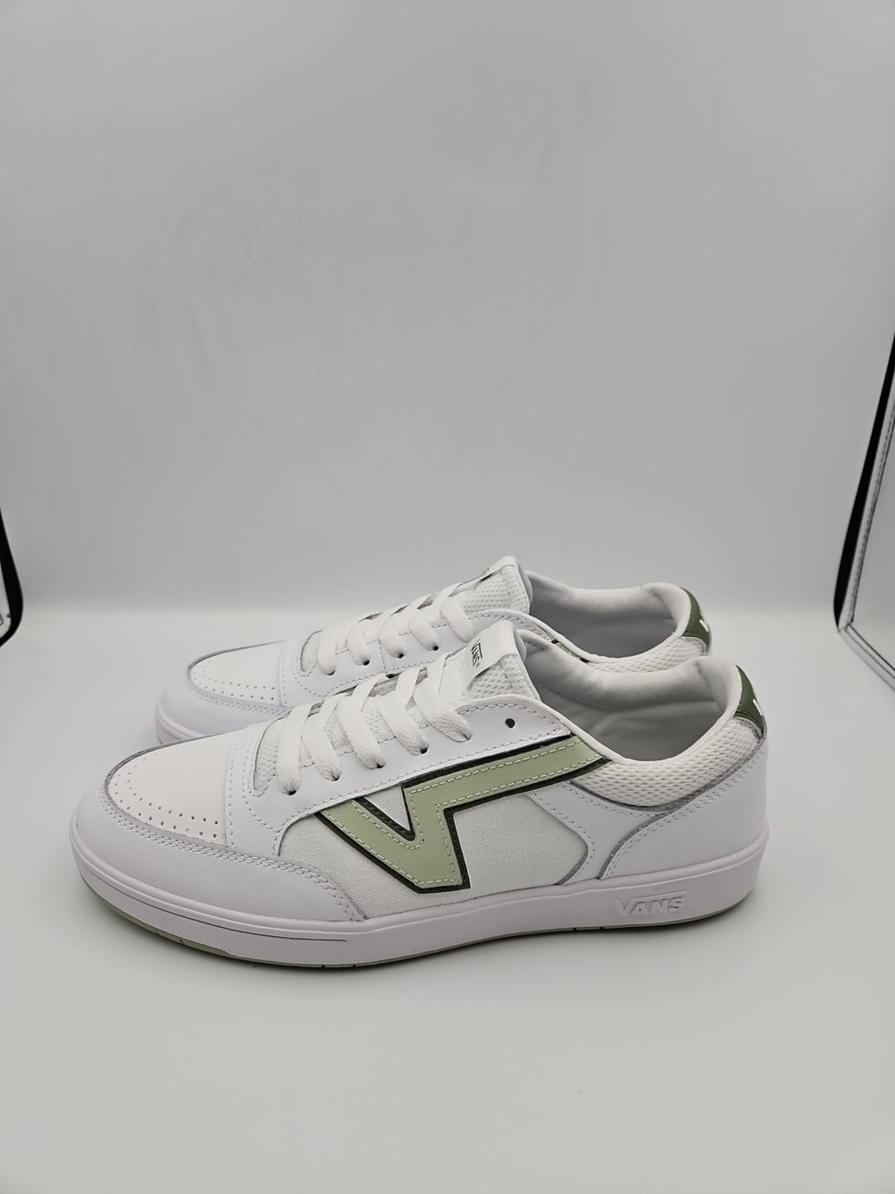 Vans White Sneakers with Light Green Accent